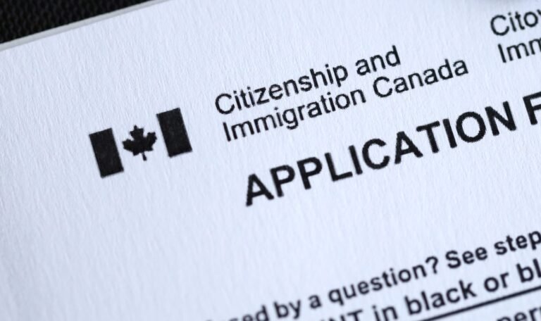 Citizenship and Immigration Canada inscription and small canadian flag