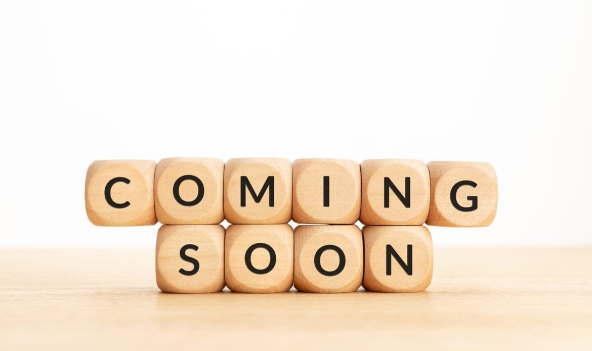 Coming soon phrase on wooden blocks