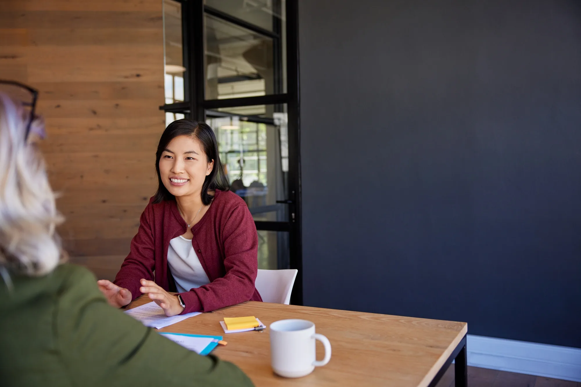 Interviewing smiling candidate for a new job application