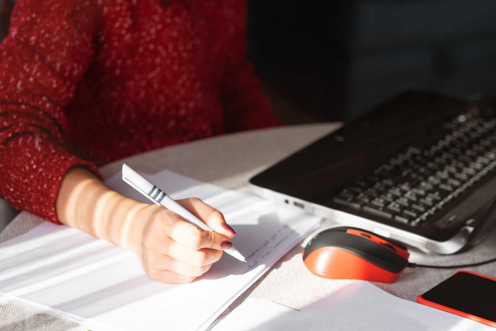 Immigration profile submission concept – person filling out forms for Canada Express Entry