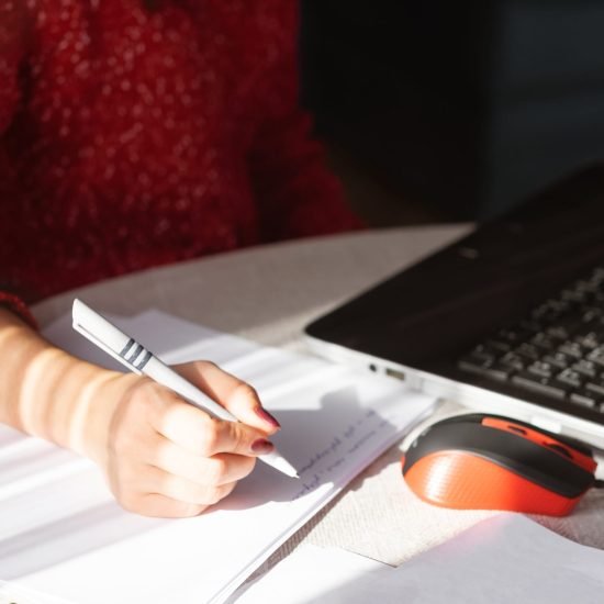 Immigration profile submission concept – person filling out forms for Canada Express Entry