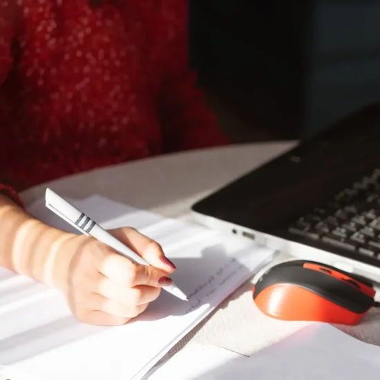 Immigration profile submission concept – person filling out forms for Canada Express Entry