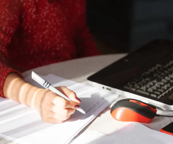 Immigration profile submission concept – person filling out forms for Canada Express Entry