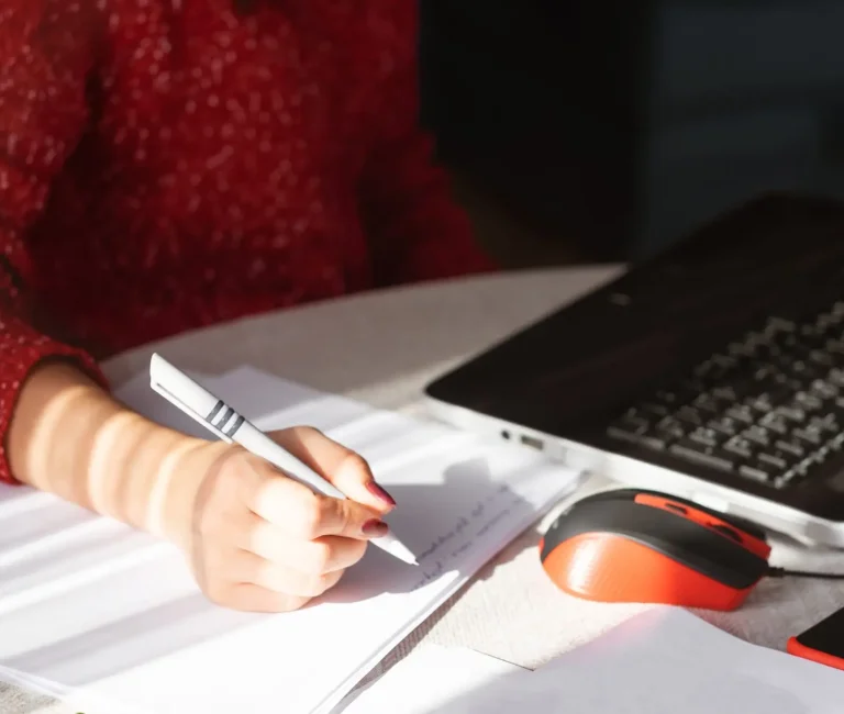 Immigration profile submission concept – person filling out forms for Canada Express Entry